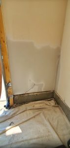 Car backed into garage after